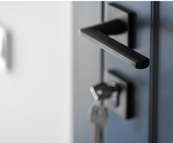 black-door-handle-blurred-keys-minimal-frame 1.png